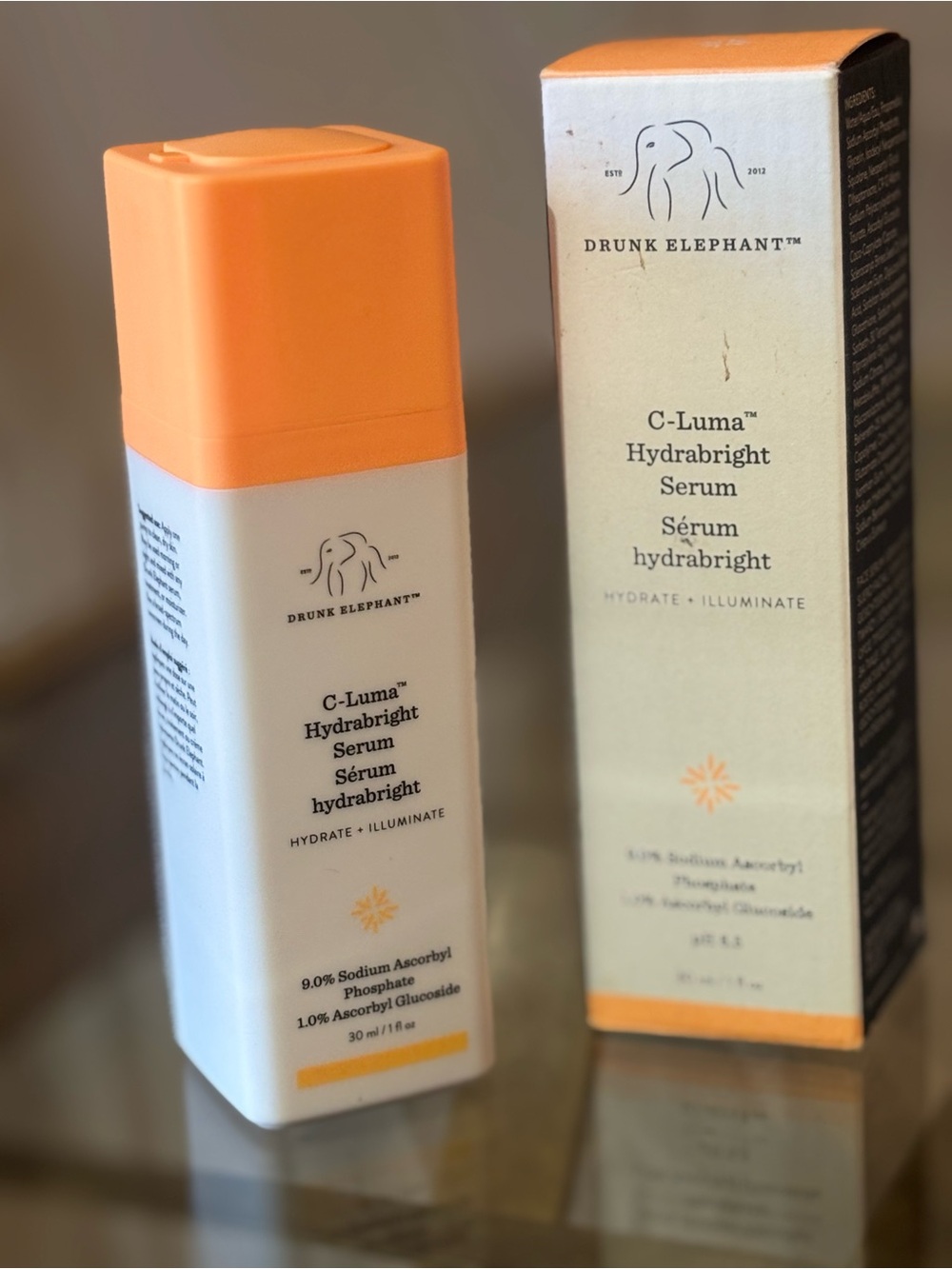 Drunk Elephant Orange and White C-Luma Hydrabrigh t Serum